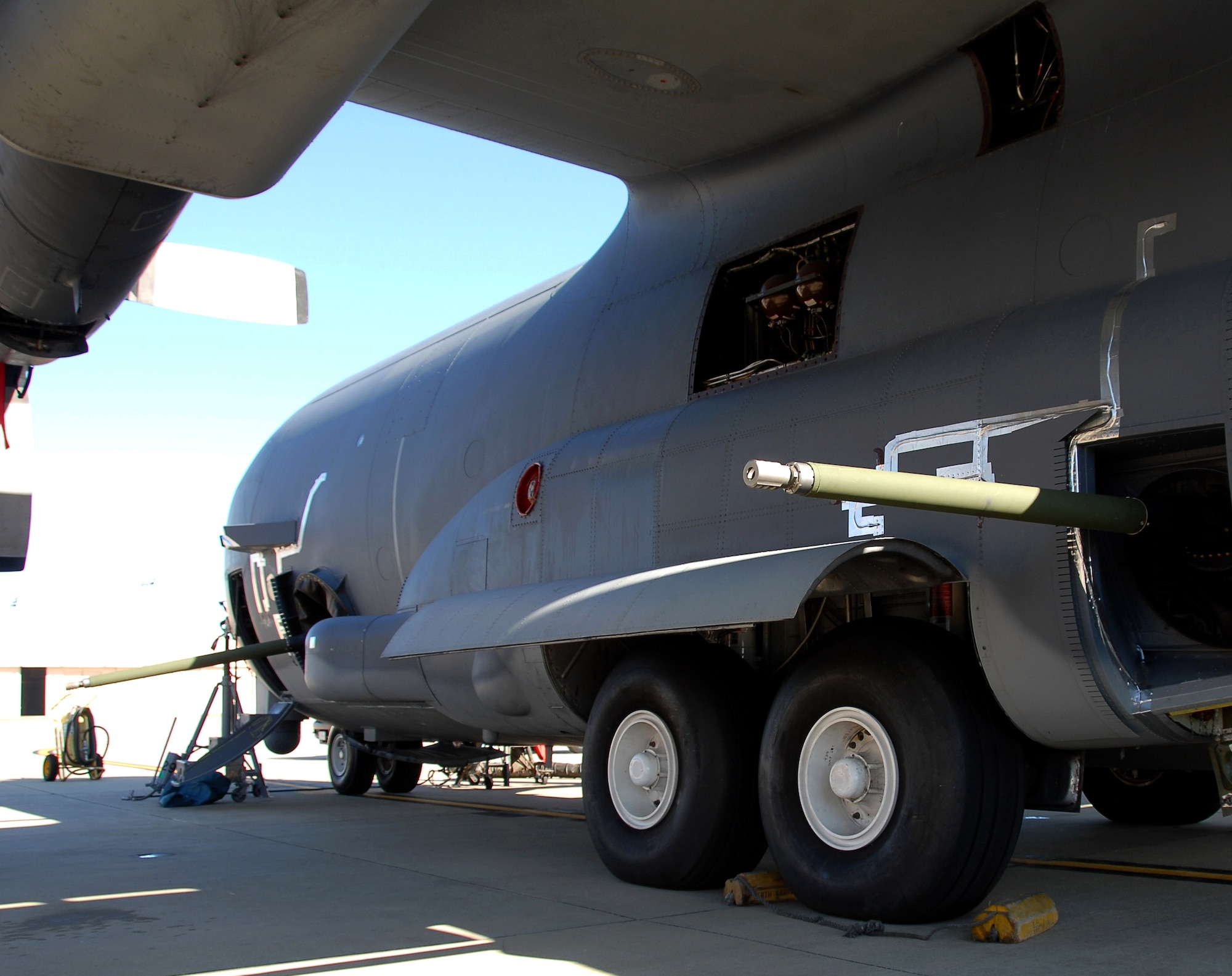 Bushmaster 30 mm cannons protrude from the gunports of an AC-130U Spooky gunship during tests Jan. 26 at Hurlburt Field, Fla. The 30 mm gun will eventually replace both the 40 mm cannon and 25 mm gun on U-model gunships. (U.S. Air Force photo/Chief Master Sgt. Gary Emery) 