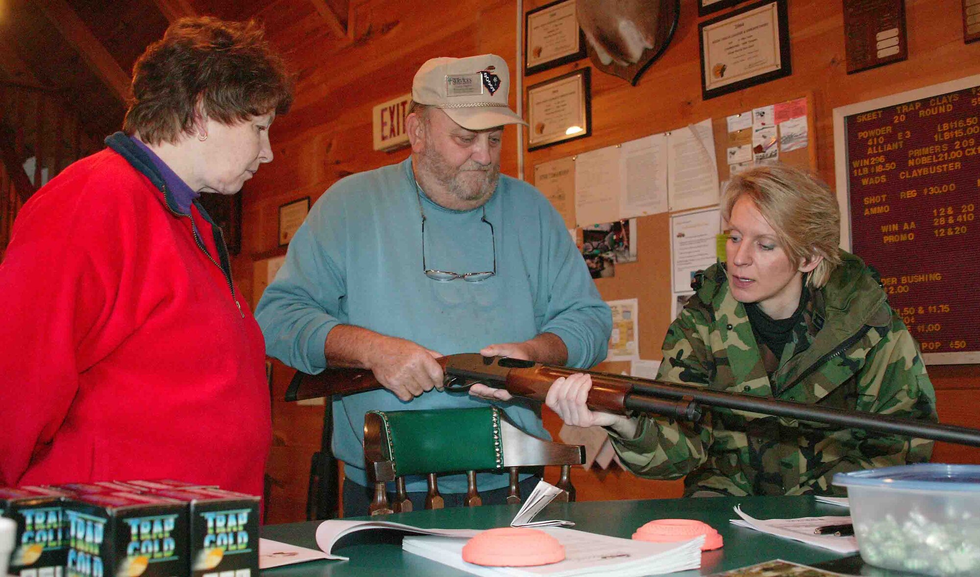 SHAW AIR FORCE BASE, S.C. -- Gene Naylor (center), 20th Services Squadron skeet and trap manager, trains retired Lt. Col. Karen Myrick (left) and Chaplain (Capt.) Melissa Ollendieck, 20th Fighter Wing chaplain's office, on gun safety Jan. 25 at the outdoor recreation center. A gun safety briefing is required for first-time shooters. (U.S. Air Force photo/Senior Airman John Gordinier)
