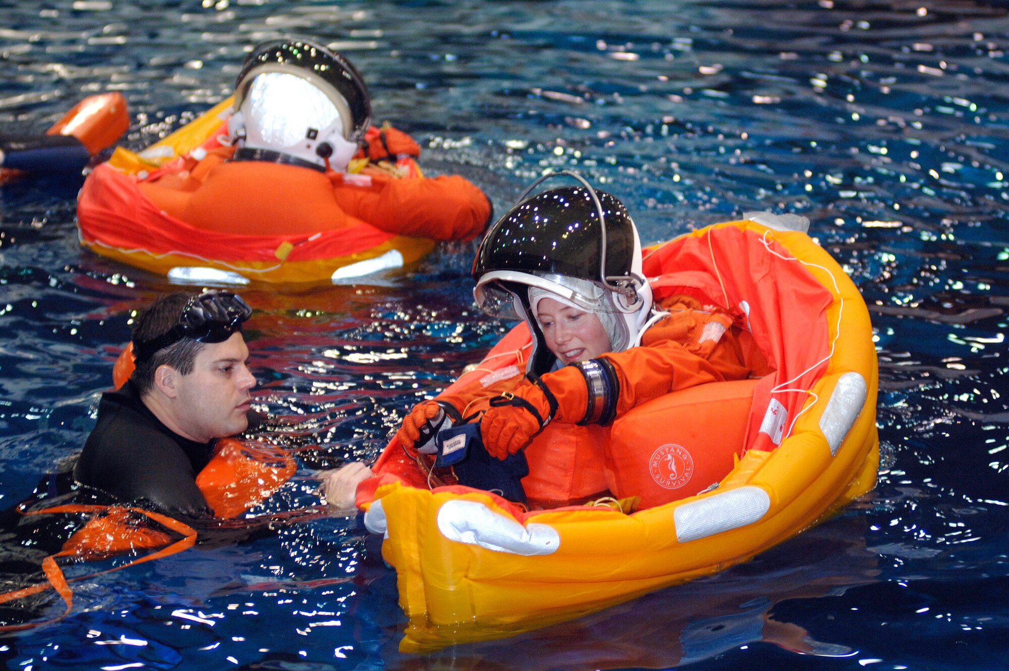 Col. Pamela Melroy practices evacuation procedures on her last day of active duty during training inside the Neutral Buoyancy Lab Jan 31at the Johnson Space Center, Houston. Colonel Melroy will be the shuttle commander on STS-120 scheduled to launch in September 2007. The lab is the world's largest indoor pool containing 6.2 million gallons of water, which is refiltered every 18 hours. (U.S. Air Force photo/Tech. Sgt. Larry Simmons)
