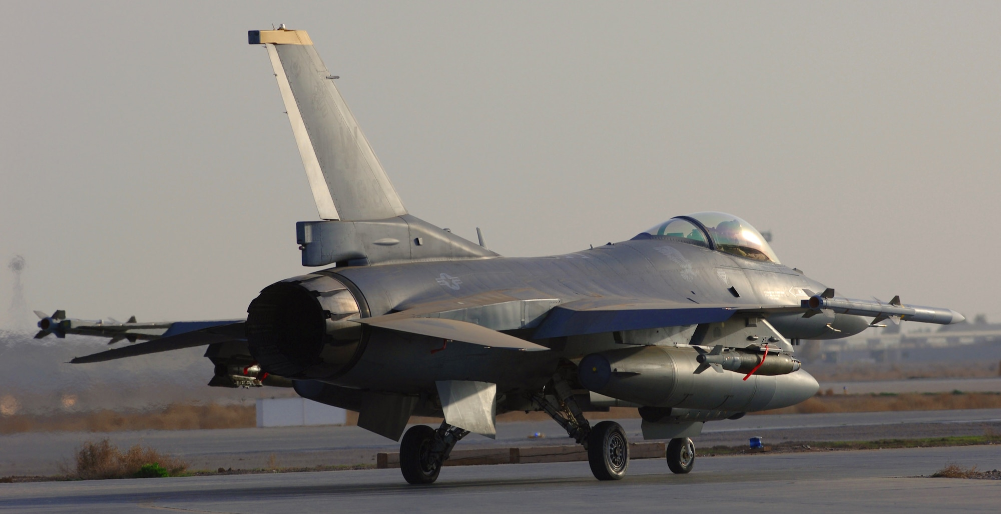F-16 Fighting Falcons, like this fighter assigned to the 332 Air Expeditionary Wing at Balad Air Base, Iraq, fly combat missions daily in support of Operation Iraqi Freedom.  The F-16, a compact, multi-role fighter, is highly maneuverable and has proven itself in air-to-air combat and air-to-ground surface attack.  (U. S. Air Force photo/Staff Sgt. Michael Holzworth)