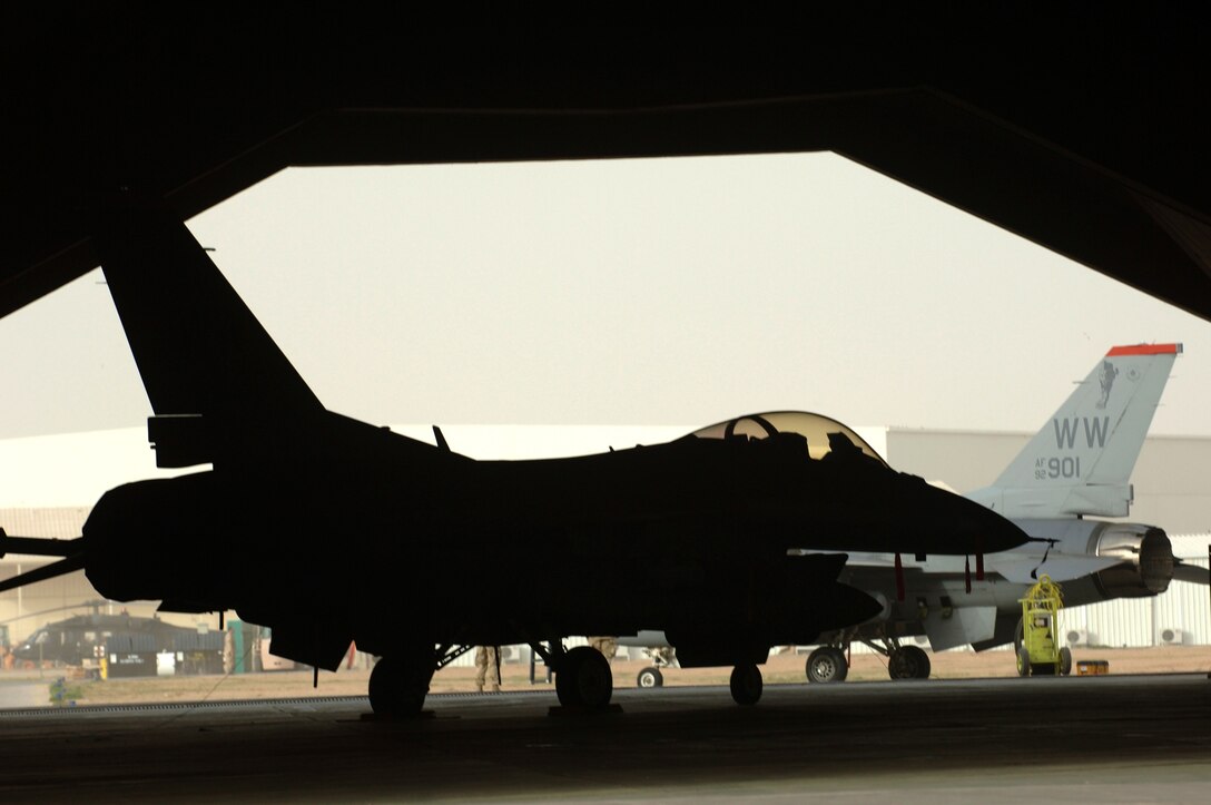 F-16 Fighting Falcons are prepared for takeoff Jan. 29 at Balad Air Base, Iraq. The 14th Fighter Squadron is deployed from Misawa Air Base, Japan, to the 332nd Air Expeditionary Wing at Balad AB. (U. S. Air Force photo/Staff Sgt. Michael R. Holzworth)

