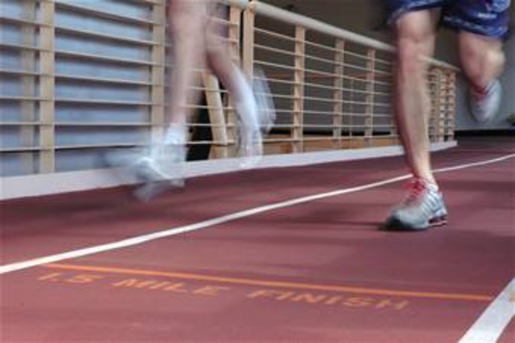 Runners on the base track.