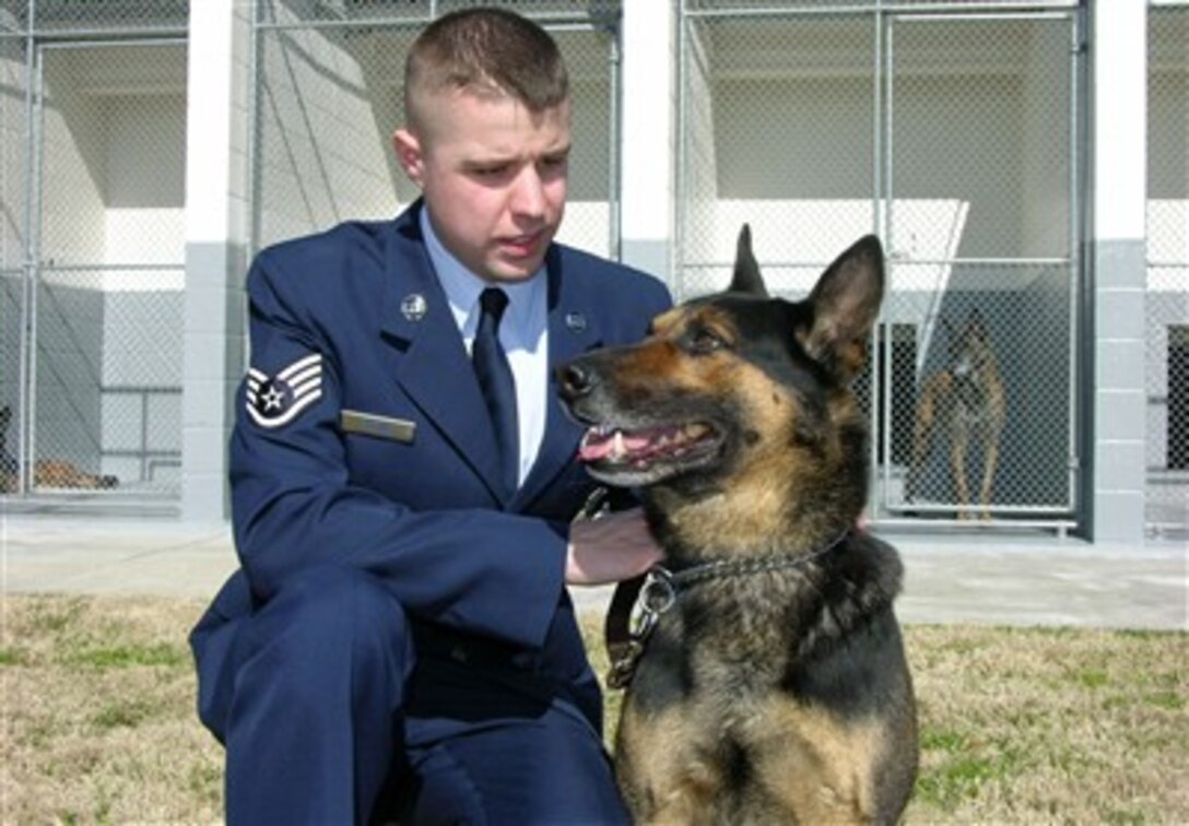 U.S. Air Force Staff Sgt. Robert Brown, 42nd Security Forces Squadron working dog handler at Maxwell Air Force Base, Ala., received a Purple Heart, Jan. 31, for wounds he sustained when he and his military working dog Nero were deployed to Iraq.