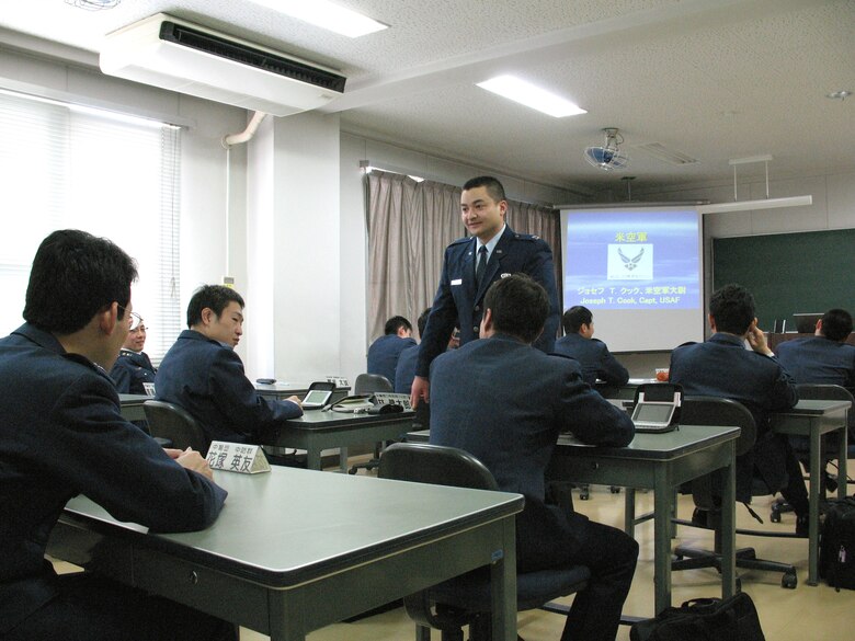Capt. Joseph Cook teaches English and offers an introduction to U.S. Air Force communication techniques to Japanes Air Self Defense Force officers and airmen Feb. 1 at Kumagaya Air Base in Japan. Captain Cook is the only American stationed here as part of the Japanese Personnel Exchange Program. (U.S. Air Force photo/Senior Airman Anthony Kuhn)
