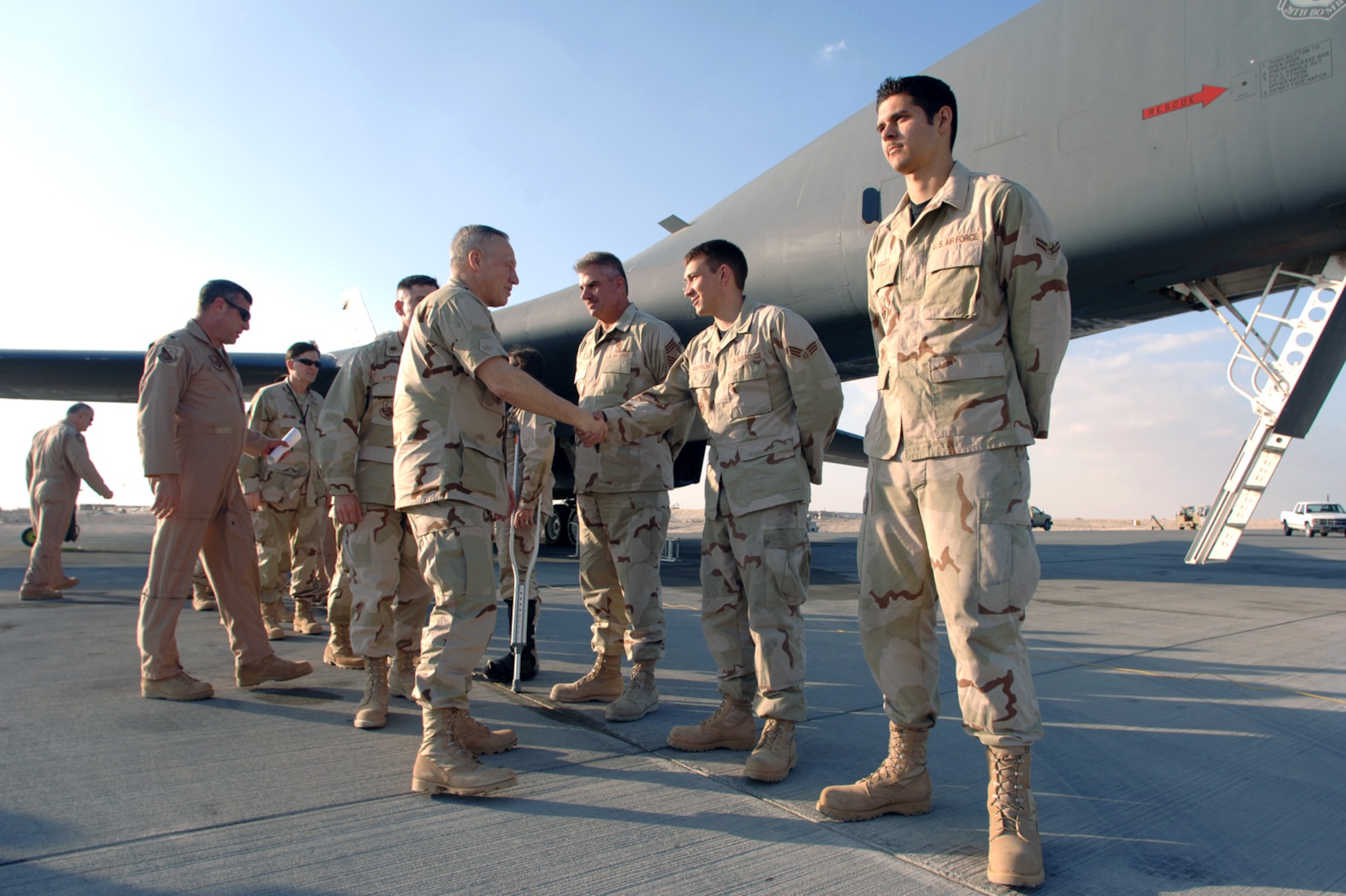 Gen. Bruce Carlson meets B-1 Lancer maintainers assigned to the 379th Expeditionary Aircraft Maintenance Squadron Airmen. Meeting the general are Chief Master Sgt. Timothy Byrd, Senior Airman Jason Anderson and Airman 1st Class Justin Bailey. General Carlson is the commander of Air Force Materiel Command. (U.S. Air Force photo/Master Sgt. Scott Wagers)
