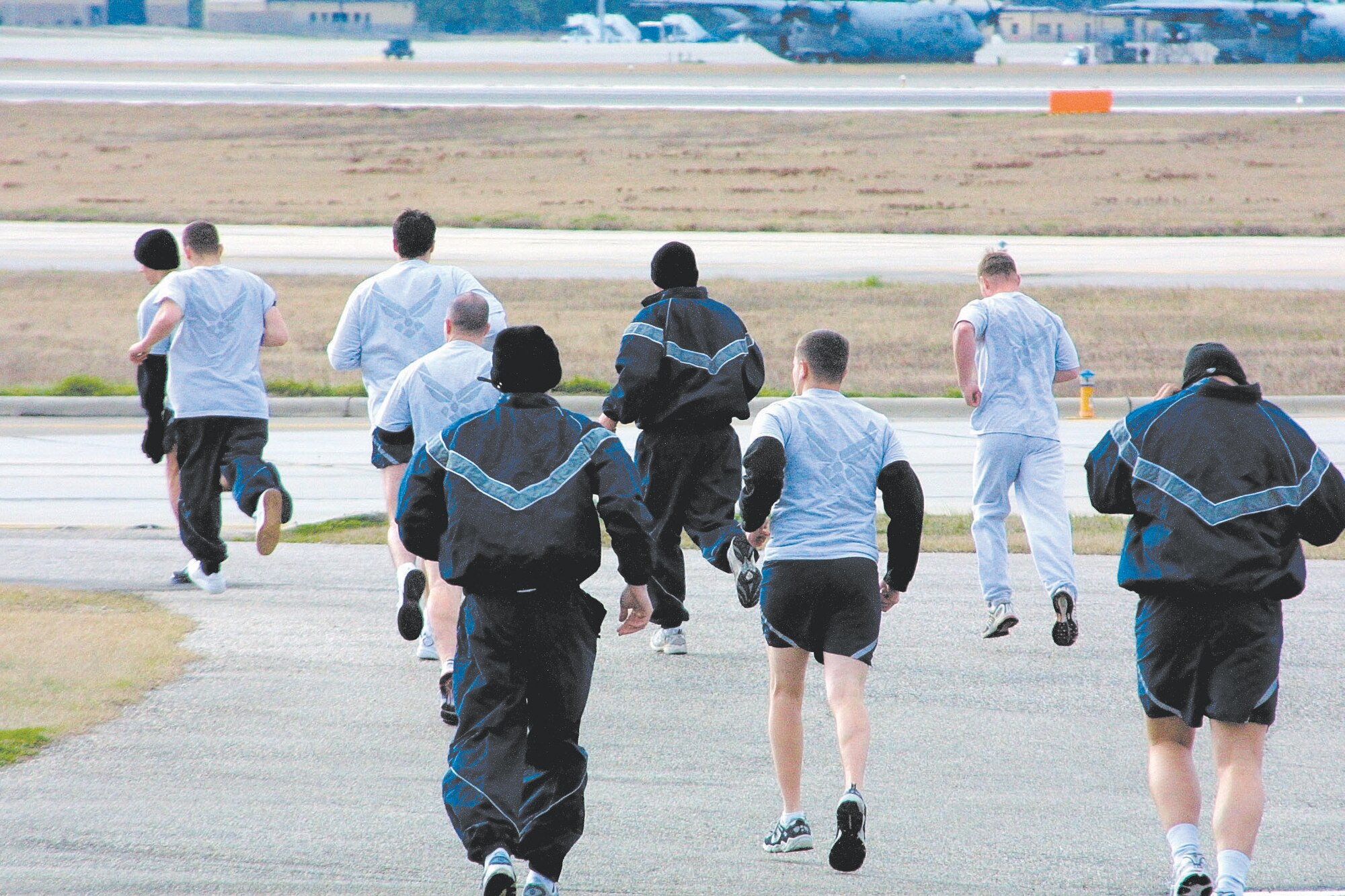 Firefighters of the 43rd Civil Engineer Squadron conducted PT Jan. 25, by running laps around their building. The firefighters perfomr PT each shift, but they must remain in the immediate area so their emergency response times are not compromised.
