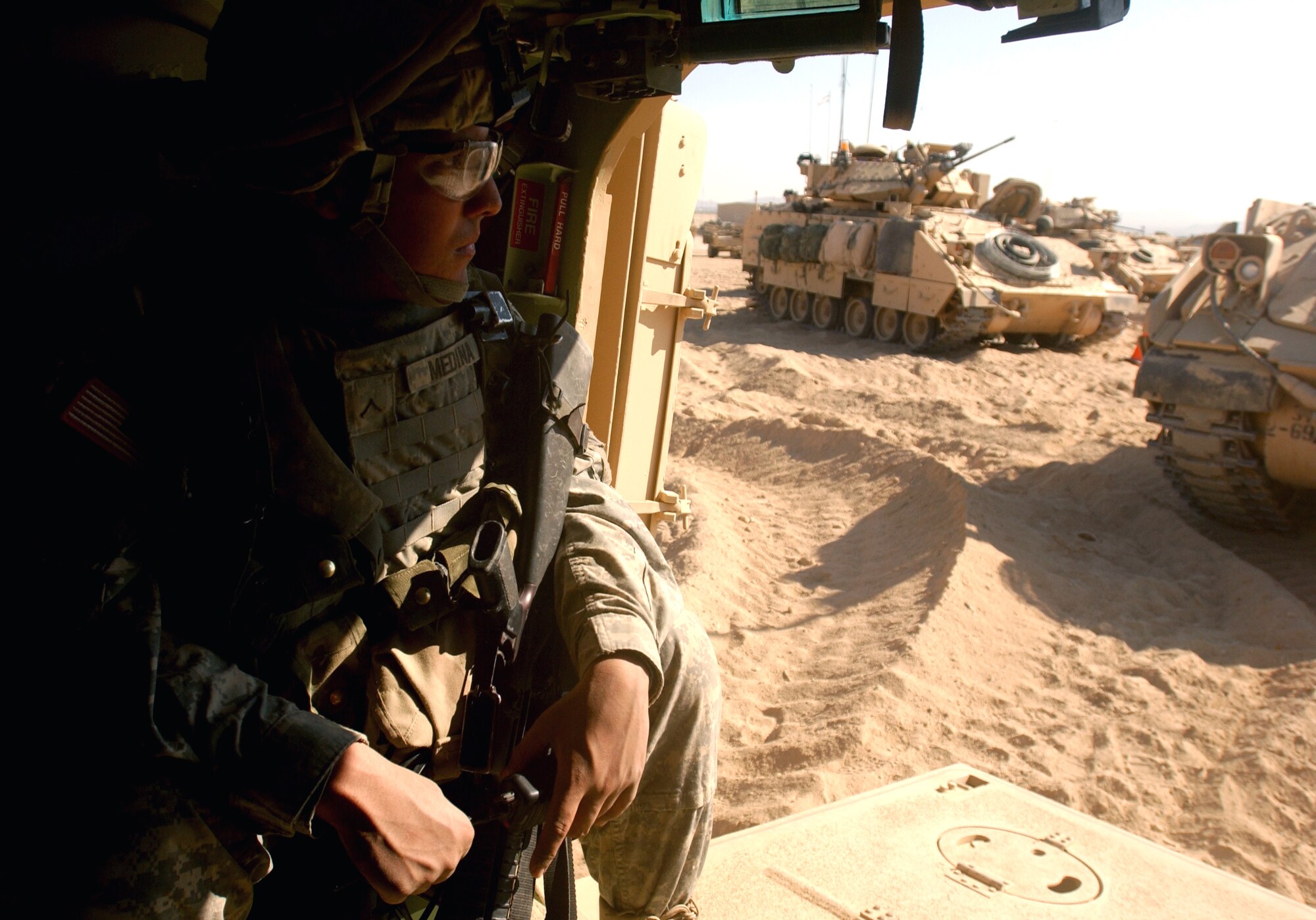 A Soldier takes part in a route clearance training scenario Jan. 22 at the National Training Center at Fort Irwin, Calif. Soldiers and Airmen are trained in a number of different scenarios that will help better prepare themselves for Iraq. The Soldier is member of Echo Company, 2-69 Armor Battalion from Fort Benning, Ga. (U.S. Air Force photo/Staff Sgt. Dennis J. Henry Jr.) 
