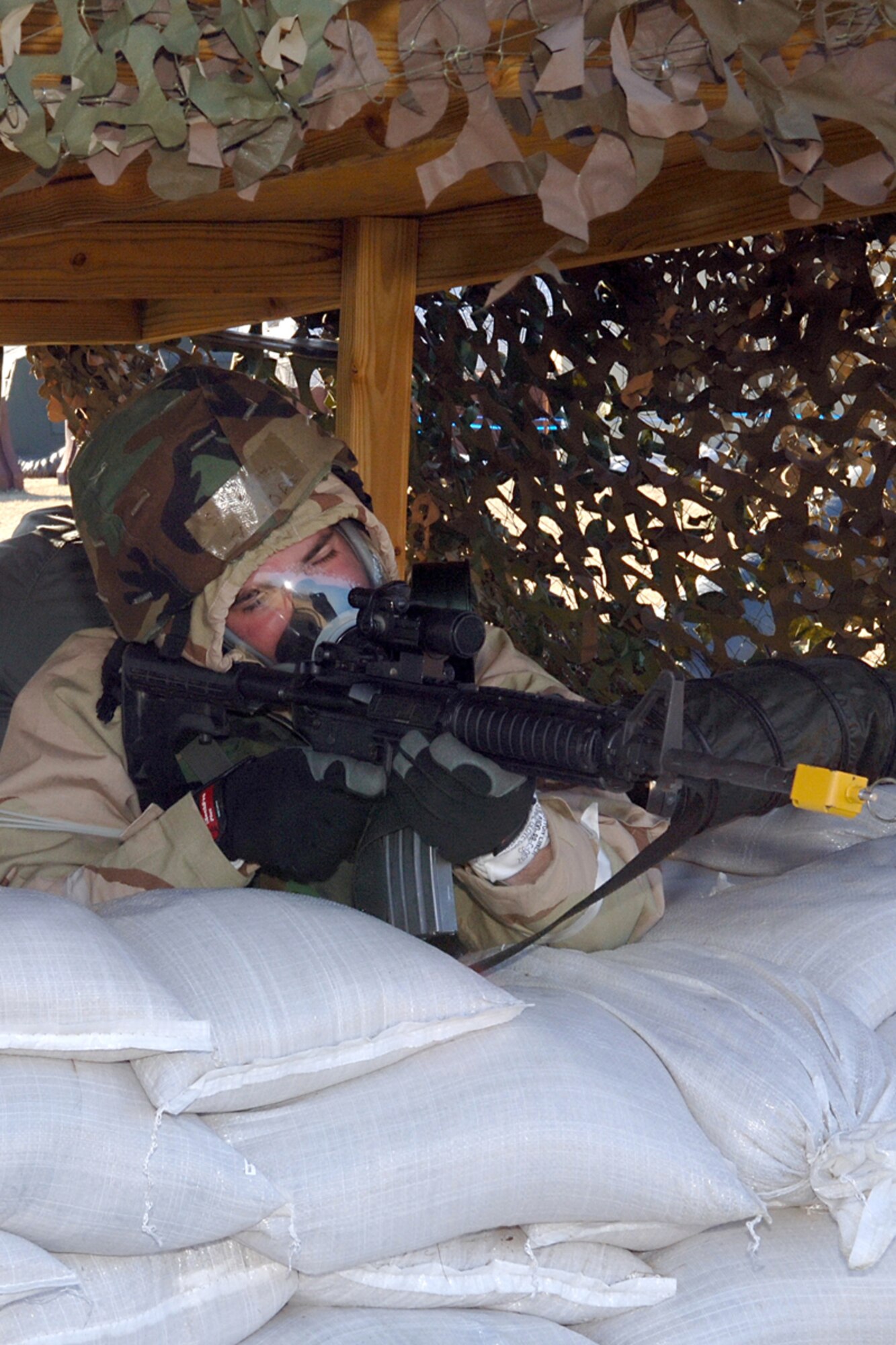 Hanscom AFB -- Senior Airman John Hooten, 66th Security Forces Squadron, mans his defensive fighting position during the January Base Readiness Exercise Jan. 26. U.S. Air Force photo by Jan Abate
