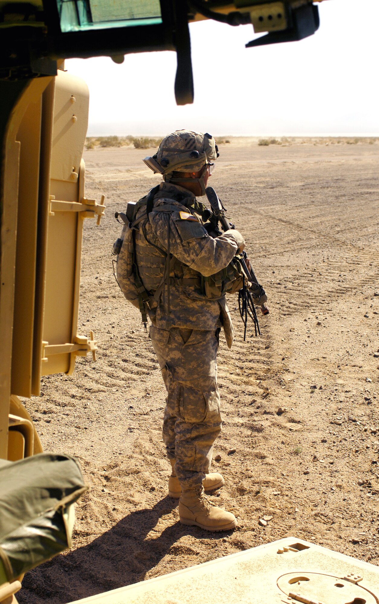 A Soldier takes part in a route clearance training scenario Jan. 22 at the National Training Center at Fort Irwin, Calif. Both Army Soldiers and Airmen are trained in a number of different scenarios that will help better prepare themselves for Iraq. The Soldier is member of Echo Company, 2-69 Armor Battalion from Fort Benning, Ga. (U.S. Air Force photo/Staff Sgt. Dennis J. Henry Jr.)
