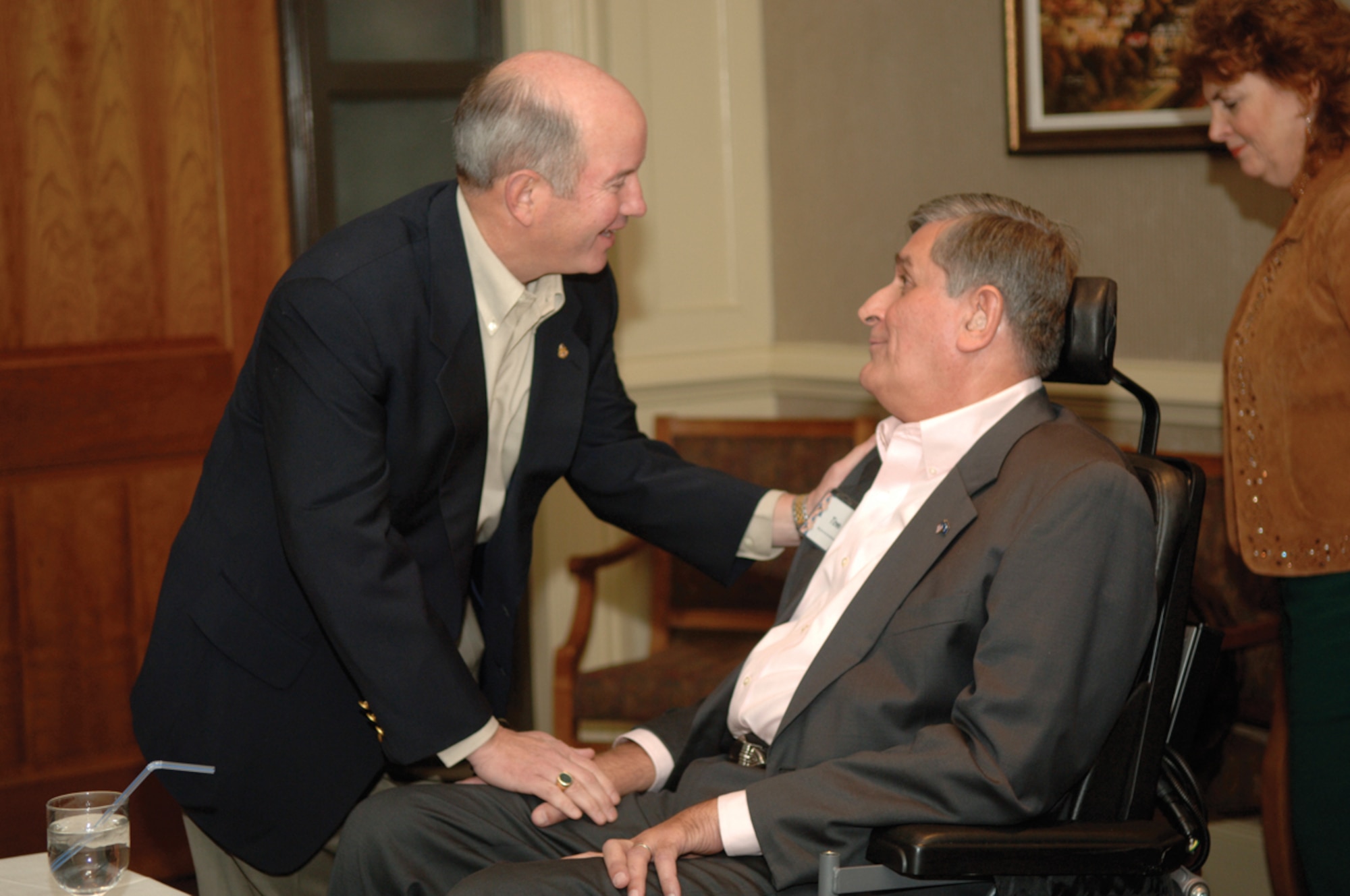 Gen. Duncan McNabb, commander of Air Mobility Command, greets retired Brig. Gen. Thomas Mikolajcik, former 437th Airlift Wing commander, before the civic leader reception at the Charleston Club Jan. 29. (U.S. Air Force photo/Airman 1st Class Nicholas Pilch)
