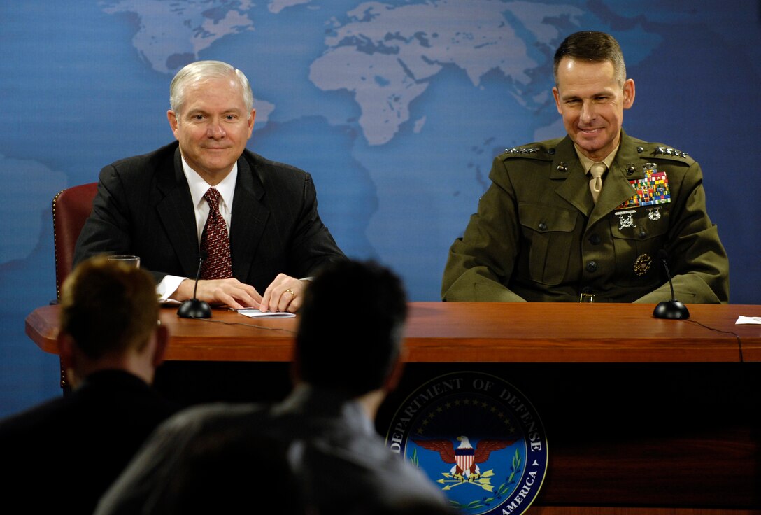 Defense Secretary Robert Gates and U.S. Marine Gen. Peter Pace, chairman of the Joint Chiefs of Staff, hold a press conference at the Pentagon, Feb. 2, 2007.  