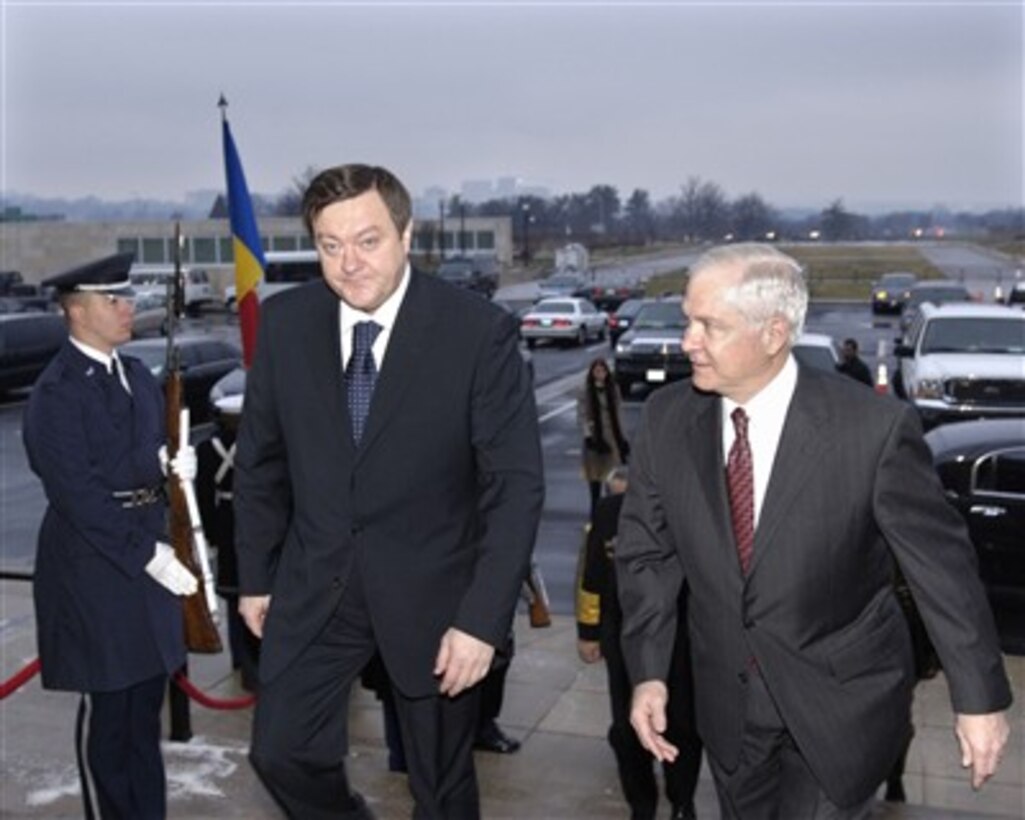 Secretary of Defense Robert M. Gates (right) escorts Romanian Minister of Defense Sorin Frunzaverde (left) through an honor cordon and into the Pentagon on Feb. 2, 2007.  Gates and Frunzaverde will hold bilateral security talks during a breakfast meeting.  