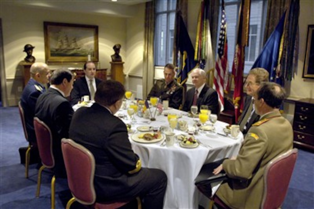Secretary of Defense Robert M. Gates (3rd from the right) hosts a Pentagon breakfast meeting with a Romanian delegation led by Minister of Defense Sorin Frunzaverde (2nd from the left).  Others participating in the talks are (Clockwise from Gates):  Assistant Secretary of Defense for International Security Affairs Peter Rodman, Romanian Defense Attaché', Brig. Gen. Liviu Serban, Romanian Chief of the General Staff Adm. Gheorghe Marin, Frunzaverde, Director for Intelligence Romanian Ministry of Defense Lt. Gen. Constatin Croitoru, Deputy Assistant Secretary of Defense for NATO and European Affairs Dan Fata, and Chairman of the Joint Chiefs of Staff Gen. Peter Pace, U.S. Marine Corps.  