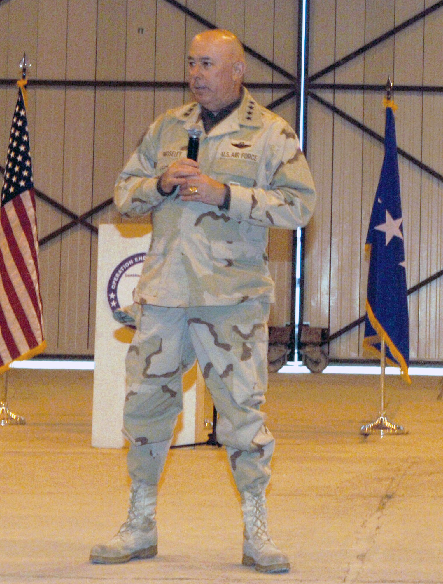 Air Force Chief of Staff Gen. T. Michael Moseley answers questions during an Airmen's call at Bagram Airfield, Afghanistan, Feb. 2. The general stopped at Bagram and Kandahar airfields during a tour of Afghanistan. (U.S. Air Force photo/Staff Sgt. Kevin Tomko)