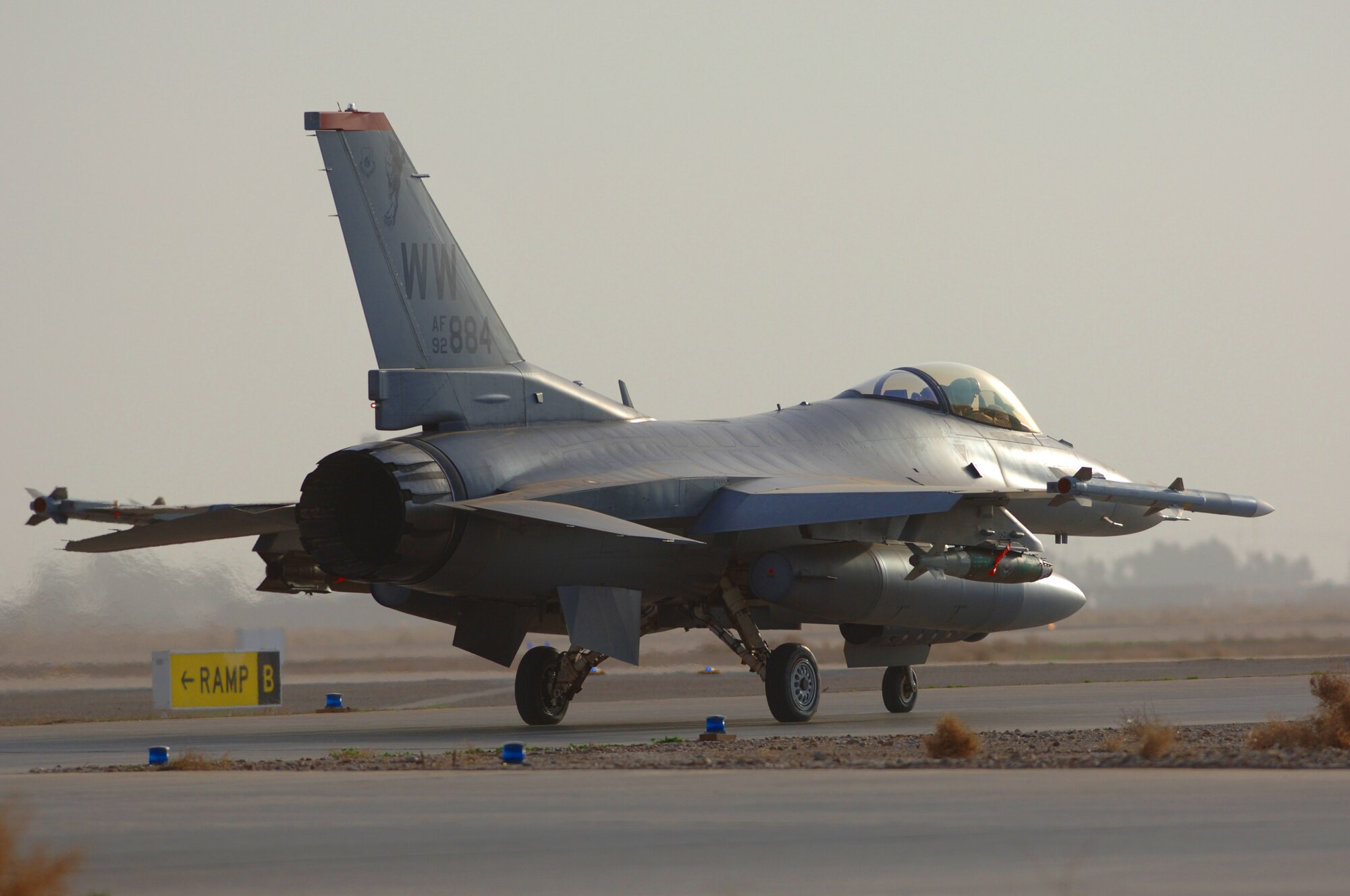 BALAD AIR BASE, Iraq -- Capt. William "Shogun" Lutmer, deployed to the 332nd Air Expeditionary Wing's 14th Expeditionary Fighter Squadron taxis an F-16 Fighting Falcon toward the runway for a combat mission Jan. 29, 2007.  The 14th FS is deployed from Misawa Air Base, Japan, and is the first Block 50 F-16 squadron deployed to Iraq. (U.S. Air Force Photo/Staff Sgt. Michael R. Holzworth)
