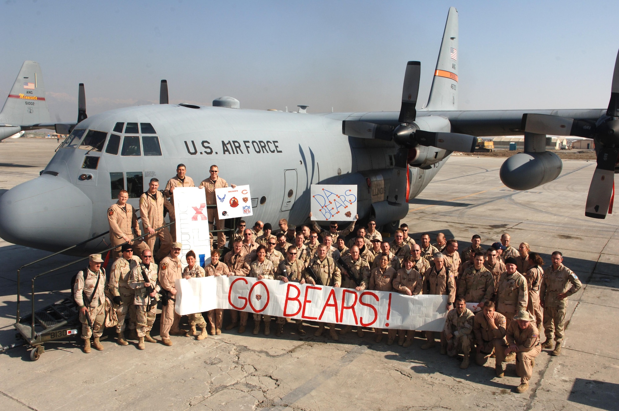 Members of the Illinois Air National Guard, who are assigned to the 774th Expeditionary Airlift Squadron at Bagram Airfield, Afghanistan, show their support for the Chicago Bears.