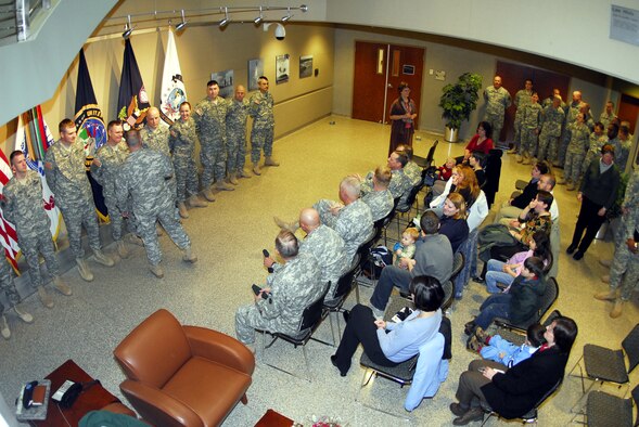 Friends and families said farewell to a team of space support Soldiers from the U.S. Army Space and Missile Defense Command/U.S. Army Forces Strategic Command (standing at left) who recently deployed in support of Operation Iraqi Freedom. They are replacing a team scheduled to return soon from a one-year tour. The team is made up of members of the Colorado Army National Guard’s 117th Space Support Battalion, part of the 1st Space Brigade.
”The 117thSpace Support Battalion has had a constant presence in Operation Iraqi Freedom since the war began,” said Lt. Col. Donald Laucirica, battalion commander. “For some of these Soldiers it is their second tour. This is a fairly common occurrence for the Colorado Army National Guard.”
Laucirica praised the Colorado Guard and the 1st Space Brigade for their support in the train up period before the team deployed. “This team is ready thanks to the efforts of a lot of people.
“We also have a very strong Family Support Group for this team. Their families will be well cared for during their tour,” he said. (U.S. Army photo)