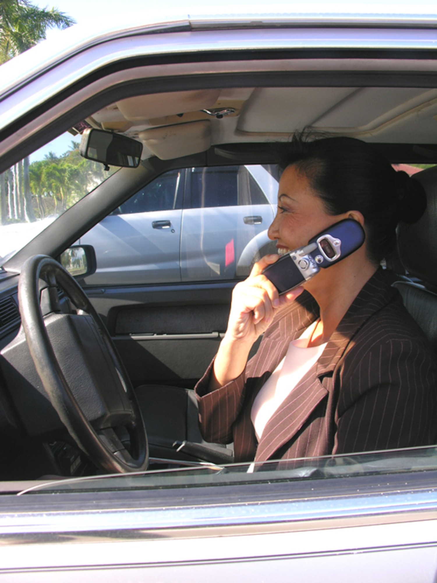 Be advised that talking could lead to walking if you drive on base while operating a cell phone. 