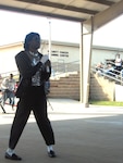 "Michael Jackson" entertains servicemembers at Camp Bullis, Texas, Jan. 27. The entertainment was one part of the day's overall events hosted by the 2007 Team Lackland African-American Heritage Committee. The Airmen were invited to participate in a dance contest and enjoy the burgers and hot dogs brought in by the committee. (USAF photo by Tech. Sgt. Lakesha Washington)