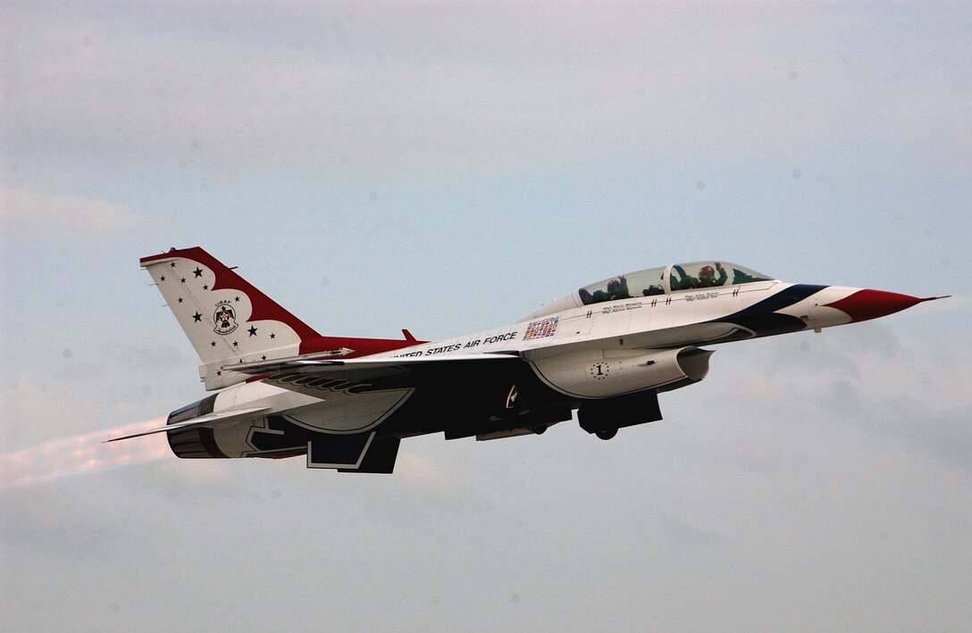 CBS Sports commentator and former NFL star Shannon Sharpe, flown by Lt. Col. Kevin Robbins, U.S. Air Force Demonstration Squadron Commander, lifts off for his orientation flight Feb. 2 here at Homestead Air Reserve Base, Fla.  His flight would be featured during the pre-game show of Super Bowl XLI on Feb. 4. The Thunderbirds came to South Florida to perform a flyover of Miami’s Dolphin Stadium for the big game. (U.S. Air Force photo/Dan Galindo)