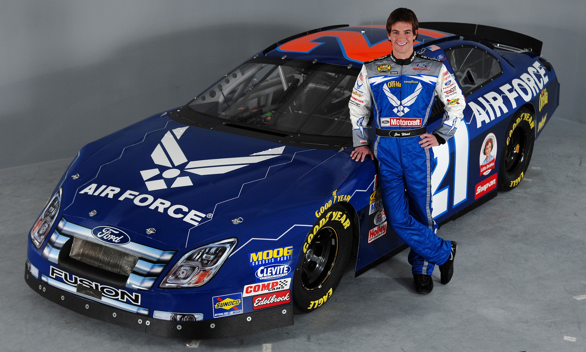 Jon Wood, the driver of No. 21, the Air Force car in the NASCAR NEXTEL Cup Series, shows off the car’s new paint scheme Jan. 25. The Air Force begins its seventh year of sponsorship in the NASCAR races when No. 21 begins the 2007 season Feb. 10 at the Budweiser Shootout at Daytona International Speedway, Fla. (U.S. Air Force photo by Master Sgt. Scott Reed)