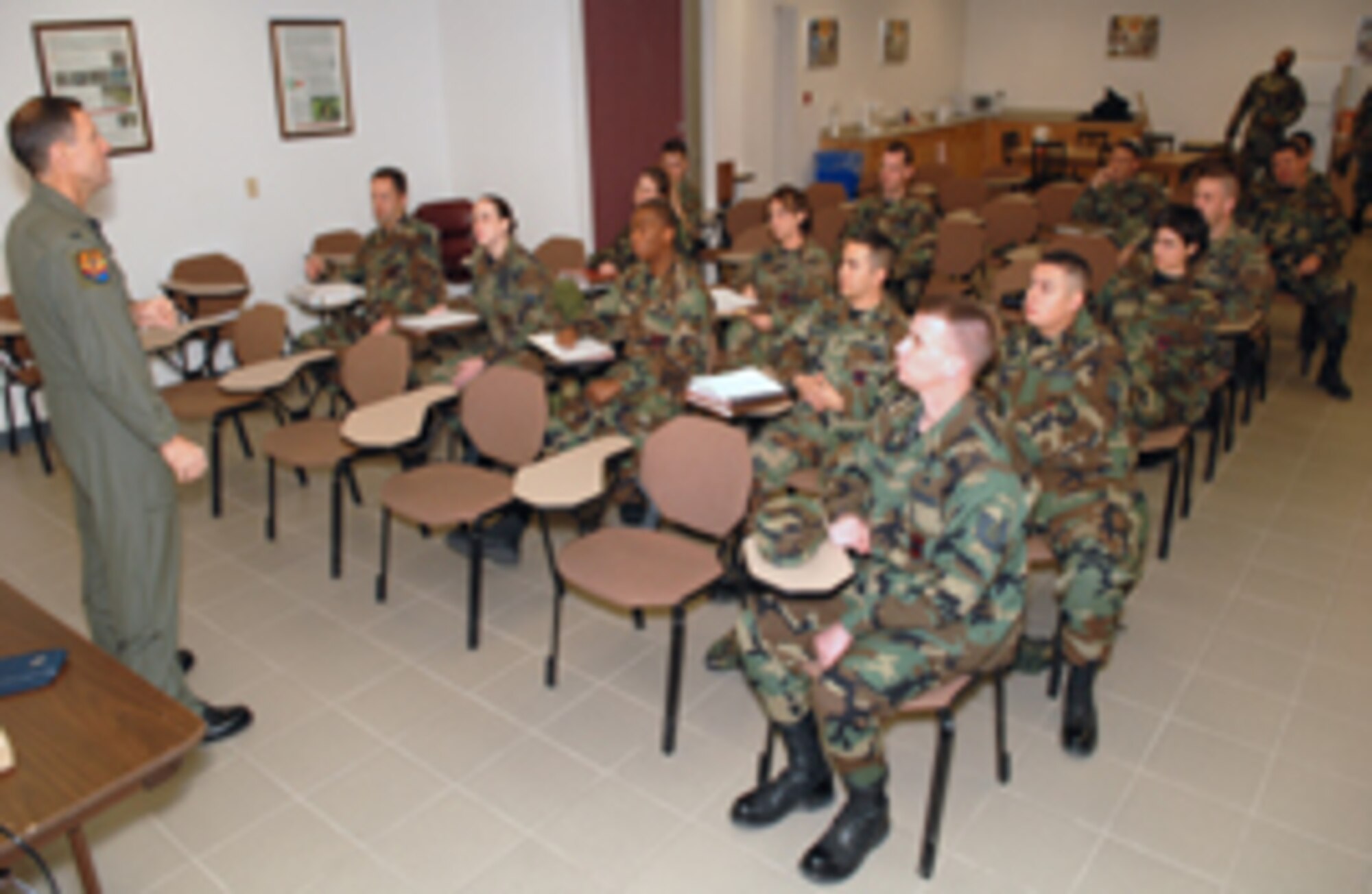 Colonel David Orr, 56th Fighter Wing vice commander, talks to Team Luke members preparing for deployment Jan. 18. In January, 191 Luke members will deploy to several countries.  According to Capt. Corinna Dieffenderfer, 56th Logistics Readiness Squadron installation deployment officer, January has been the busiest month for Air Expeditionary Force 5. By the end of April, it is projected that 283 servicemembers will
deploy from Luke.  (Photo by Master Sgt. William Gomez)