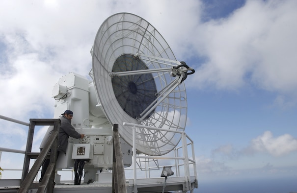 Salvador Sanchez, contractor for Western Range Operations Communications and Information (WROCI), rotates the FPS-16 radar used to track launching missiles at Tranquillon Peak on Vandenberg AFB February 1, 2007. The radar is used to provide data and track missiles during launches. This radar, along with its data system, will be tracking the upcoming Feb. 7 Minuteman III launch to direct the missile and ensure its direction is not altered.  (U.S. Air Force photo by Airman 1st Class Ashley Tyler)