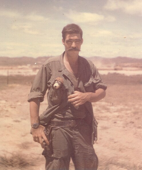 In 1968, Snoopy was discovered in the back of truck by then Corporal Thomas Wolf. Snoopy traveled with Wolf during his 27-year military career spanning the Marine Corps, Army Reserve, Navy Reserve and finally Air Force Reserve. Sergeant Wolf retired from the 916th Air Refueling Wing in May 2001 and left Snoopy to carry on his military career with his son, Karl Wolf, in the 916th Security Forces Squadron.