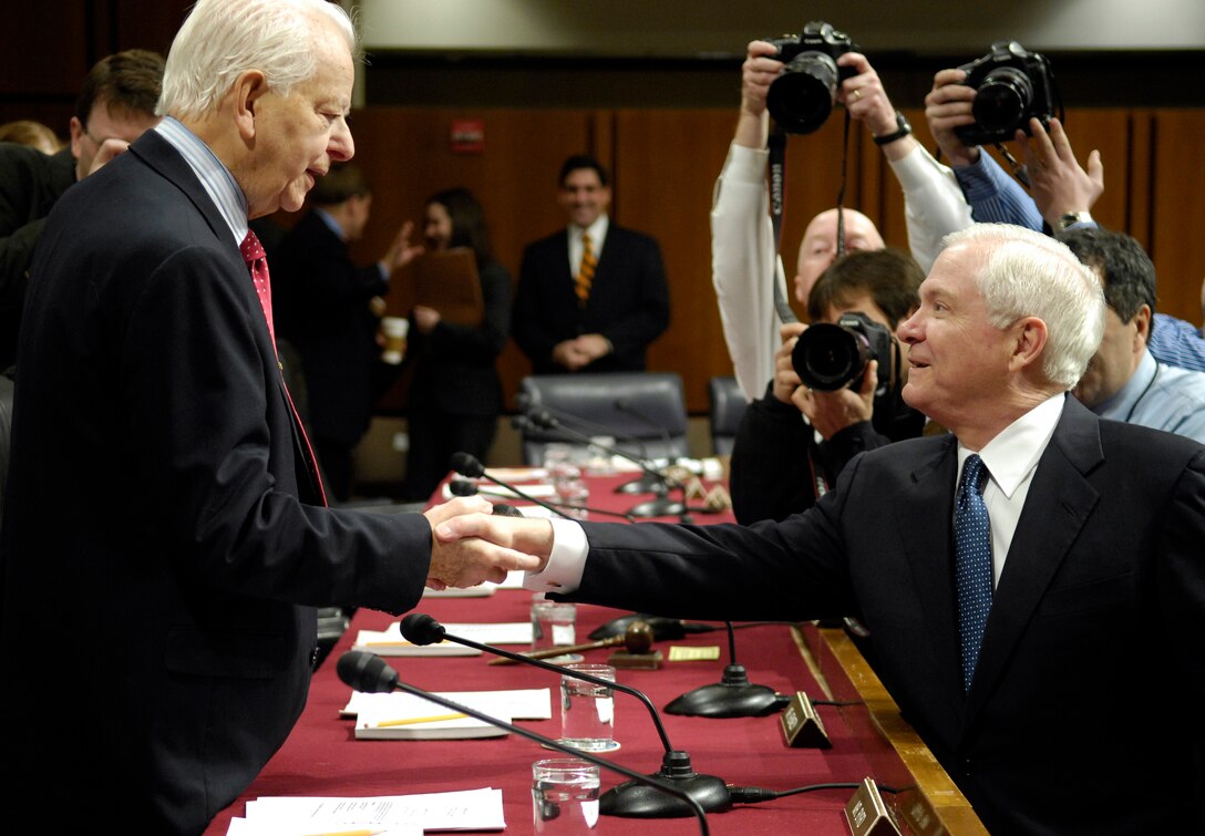 Defense Secretary Robert Gates shakes hands with U.S. Sen. Robert Byrd prior to the start of a Senate Armed Services Committee hearing about the 2008 Defense Department budget in Washington, Feb. 6, 2007.