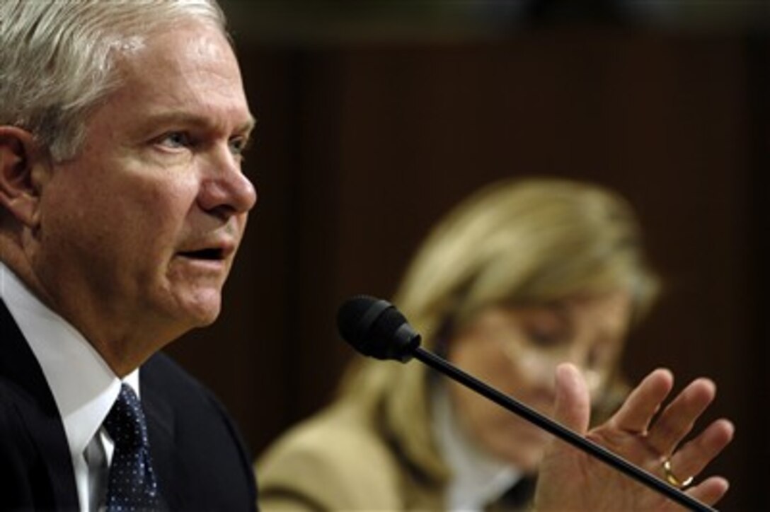 Defense Secretary Robert Gates responds to a question during a Senate Armed Services Committee hearing about the 2008 Defense Department budget with Tina Jonas, right, under secretary of defense comptroller, in Washington, Feb. 6, 2007. 