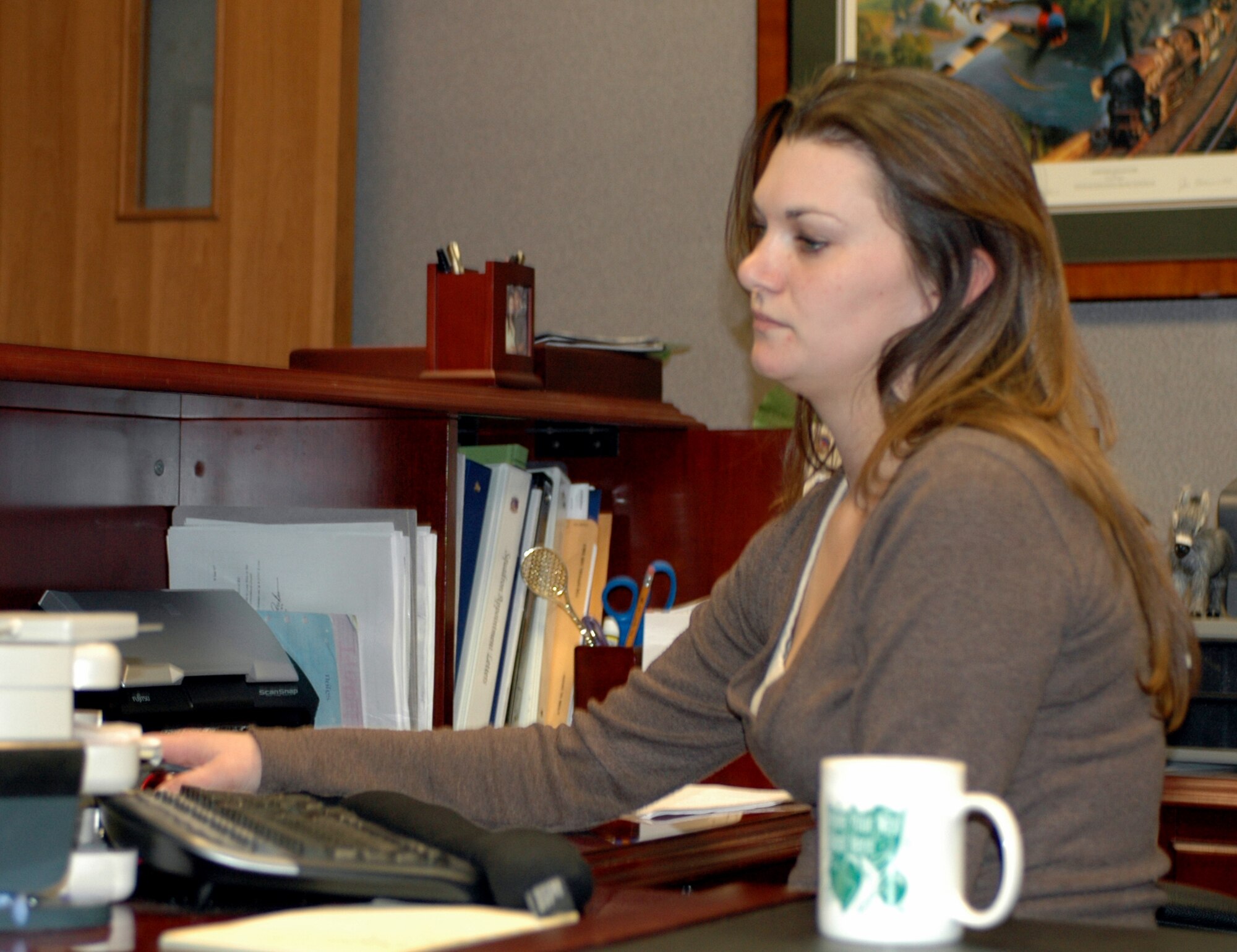 Mrs. Shavonne Krystle Delgado, 22nd Airlift Squadron’s administrative assistant, was selected as Travis' Warrior of the Week. (U.S. Air Force photo by Jennifer Brugman)
