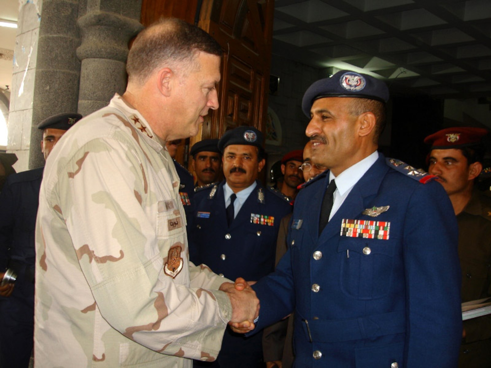 Lt. Gen. Gary L. North says goodbye to Yemeni Brig. Gen. Mohammed Saleh Al-Ahmar as he leaves the Yemeni air force headquarters Feb. 7 in Yemen. General North is the commander of U.S. Central Command Air Forces and met with senior Yemini air force officials and the U.S. ambassador to Yemen. (U.S. State Department photo/Ann Marie Roubachewsky) 
