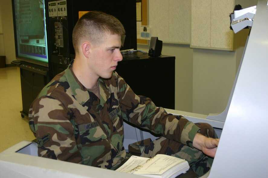 Airman 1st Class Ian McAlister, an F-15 avionics apprentice with the 365th Training Squadron, continues his education on a mockup of an E-model avionics trainer.  Airman McAlister is the first ACE student for the Sheppard's F-15 course in nearly four years, scoring 100% on all of his block tests.  (U.S. Air Force/SSgt Tonnette Thompson)