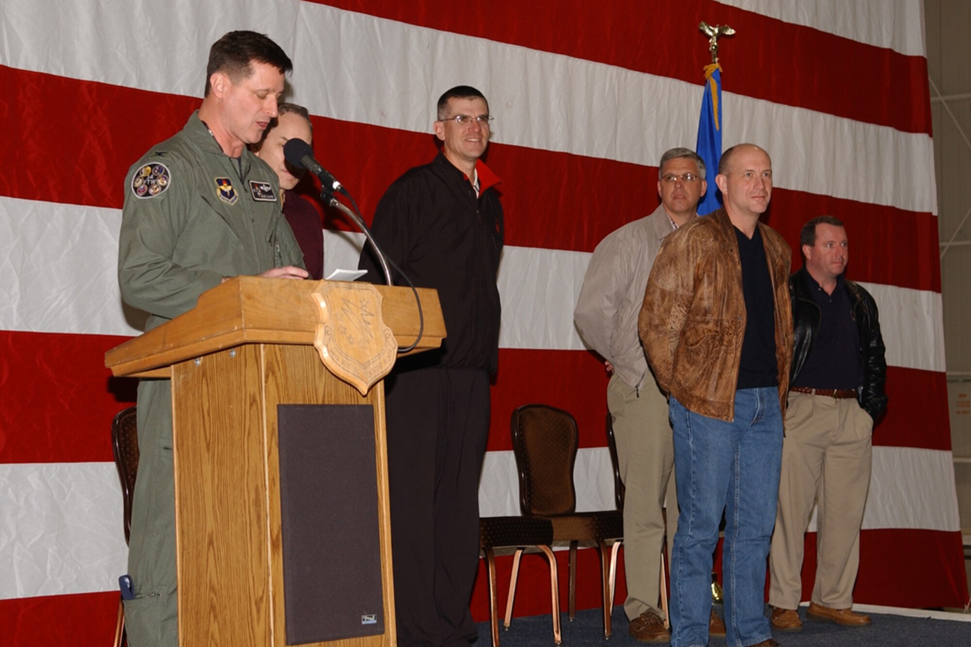 Colonel Mark Baker, 14th Flying Training Wing vice commander, introduces members for the Installation Excellence Team to Columbus Air Force Base Jan. 31 at the BLAZE Hangar.