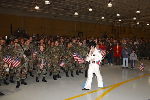 "Elvis," Lt. Col. Jeffery Snell, 14th Operations Group, entertains almost 1,000 BLAZE Team Airmen and civilians waiting for the arrival of the Commander-In-Chief Installation Excellence Selection Board members.