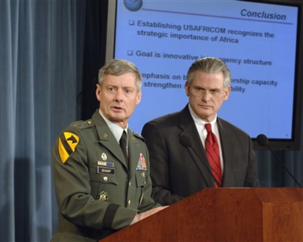 Principal Deputy Under Secretary of Defense for Policy Ryan Henry (right) and the Director of the Joint Staff Lt. Gen. Walter Sharp (left), U.S. Army, discuss the establishment of the U.S. Africa Command during a Pentagon press briefing on Feb. 7, 2007.  