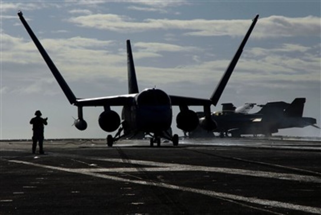 An S-3B Viking assigned to the "Topcats" of Sea Control Squadron 31 folds its wings after landing on the USS John C. Stennis in the Pacific Ocean, Feb. 4, 2007. The Stennis Carrier Strike Group is conducting flight and integrated strike group operations off the coast of Guam after entering the 7th Fleet area of responsibility.
