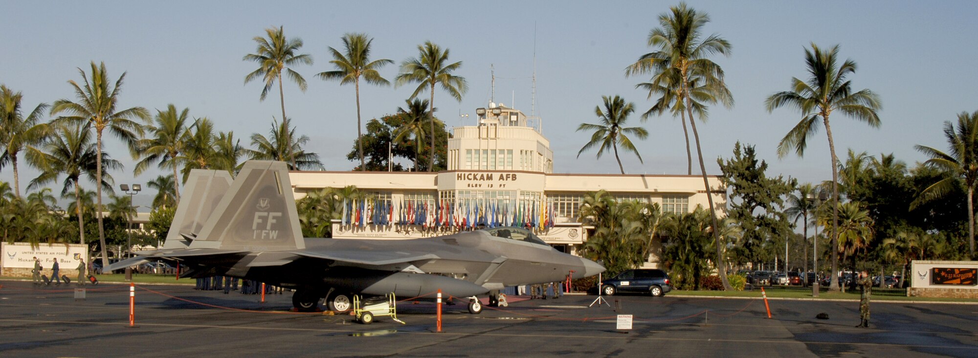 HICKAM AIR FORCE BASE, Hawaii -- An F-22 sits on the ramp here Feb. 8, 2007, while on its way to Kadena Air Base, Japan. The 27th Fighter Squadron, Langley Air Force Base, Va. are deploying 12 F-22s and more than 250 personnel overseas for the first time to Japan. (U.S. Air Force photo by Vanessa Perez) 