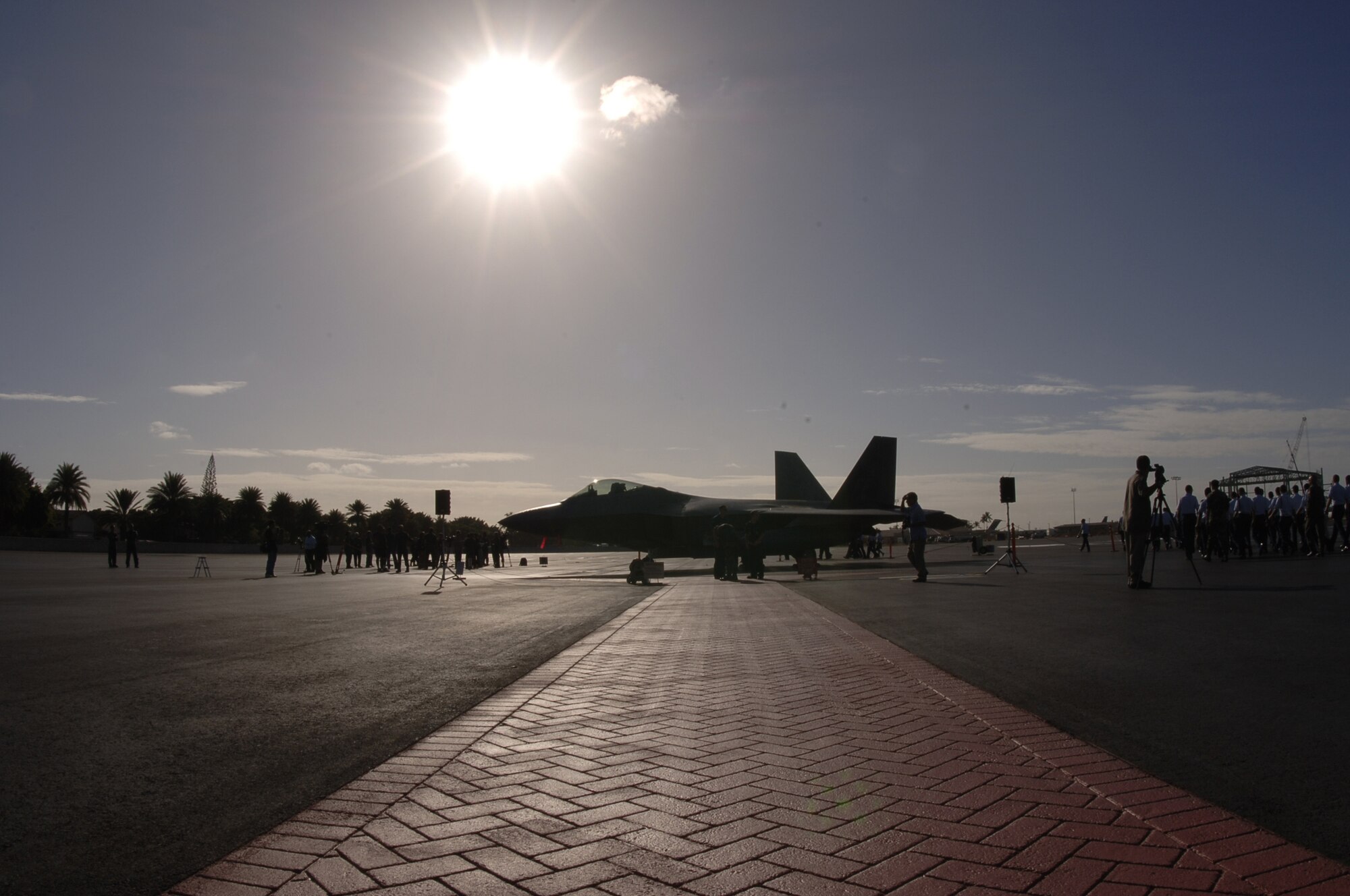 HICKAM AIR FORCE BASE, Hawaii -- An F-22 sits on the ramp here Feb. 8, 2007, while on its way to Kadena Air Base, Japan. The 27th Fighter Squadron, Langley Air Force Base, Va. are deploying 12 F-22s and more than 250 personnel overseas for the first time to Japan. (U.S. Air Force photo by Vanessa Perez) 