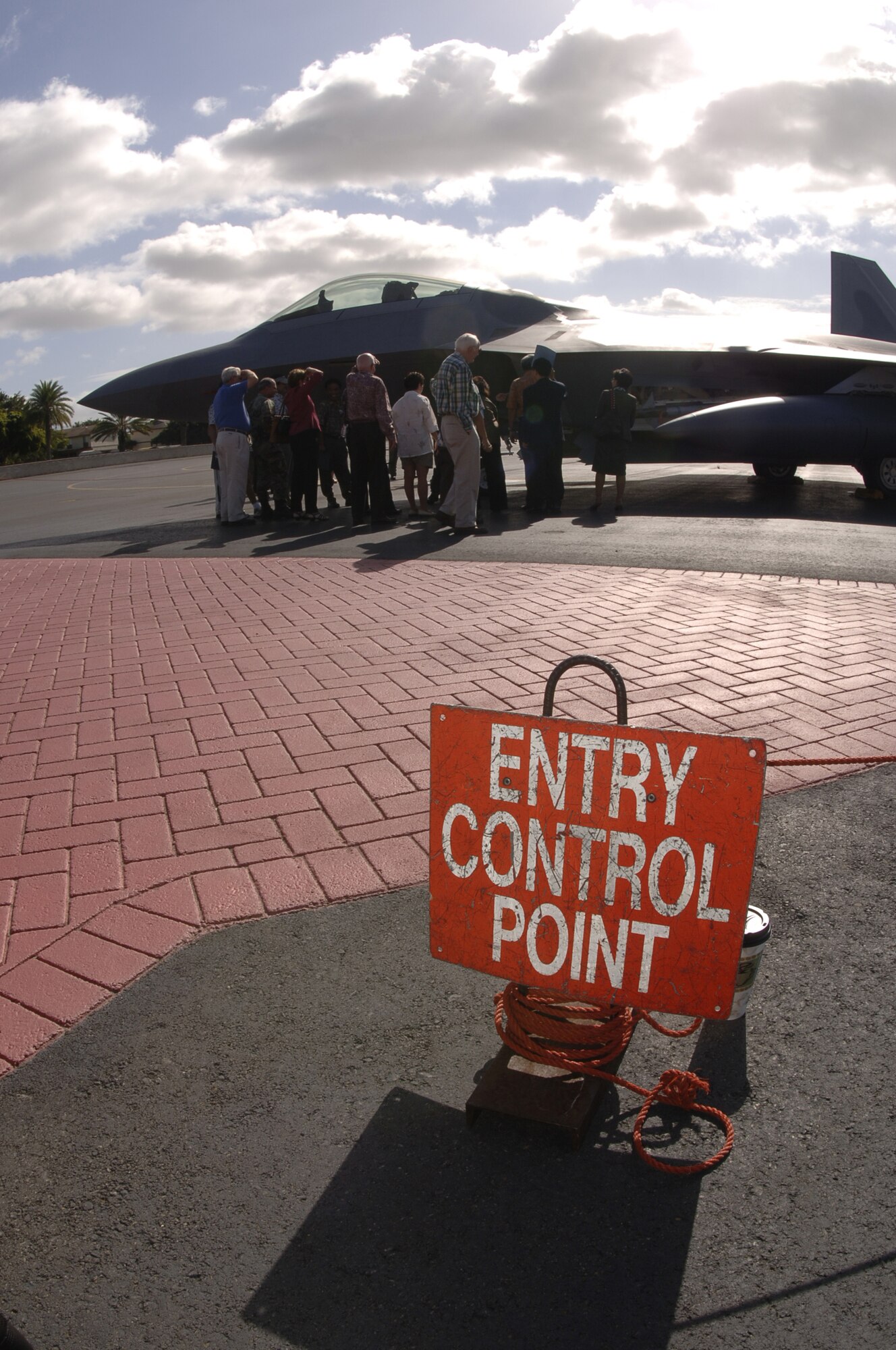 HICKAM AIR FORCE BASE, Hawaii -- An F-22 sits on the ramp here Feb. 8, 2007, while on its way to Kadena Air Base, Japan. The 27th Fighter Squadron, Langley Air Force Base, Va. are deploying 12 F-22s and more than 250 personnel overseas for the first time to Japan. (U.S. Air Force photo by Vanessa Perez) 