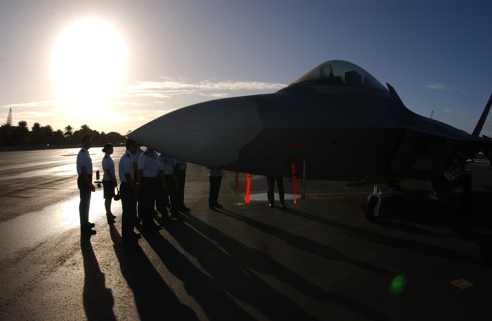 HICKAM AIR FORCE BASE, Hawaii -- An F-22 sits on the ramp here Feb. 8, 2007, while on its way to Kadena Air Base, Japan. The 27th Fighter Squadron, Langley Air Force Base, Va. are deploying 12 F-22s and more than 250 personnel overseas for the first time to Japan. (U.S. Air Force photo by Vanessa Perez) 
