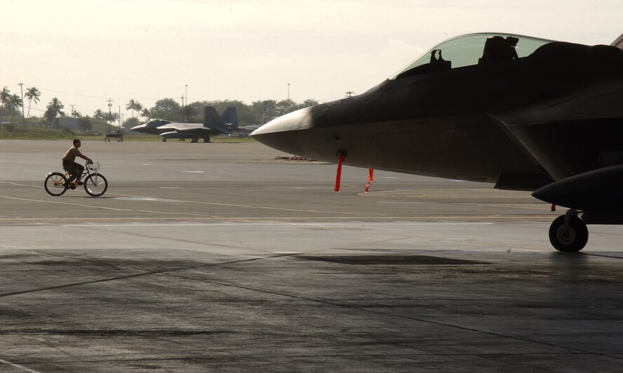 HICKAM AIR FORCE BASE, Hawaii -- An F-22 sits on the ramp here Feb. 8, 2007, while on its way to Kadena Air Base, Japan. The 27th Fighter Squadron, Langley Air Force Base, Va. are deploying 12 F-22s and more than 250 personnel overseas for the first time to Japan. (U.S. Air Force photo by Vanessa Perez) 