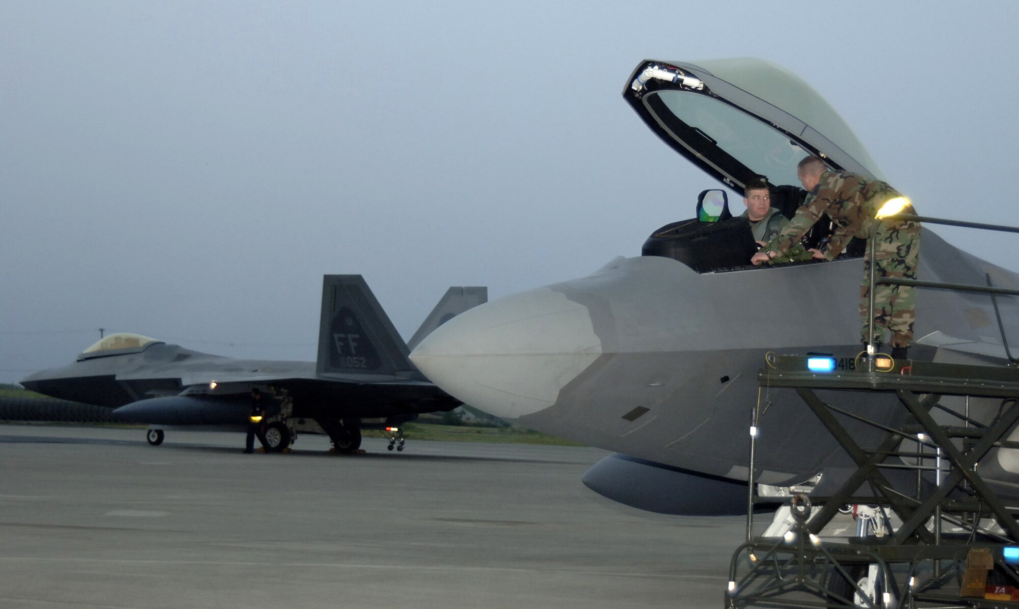 HICKAM AIR FORCE BASE, Hawaii -- The first F-22s arrive here Feb. 7, 2007, on their  way to Kadena Air Base, Japan. The 27th Fighter Squadron, Langley Air Force Base, Va. are deploying 12 F-22s and more than 250 personnel overseas for the first time to Japan. (U.S. Air Force photo by Vanessa Perez) 

