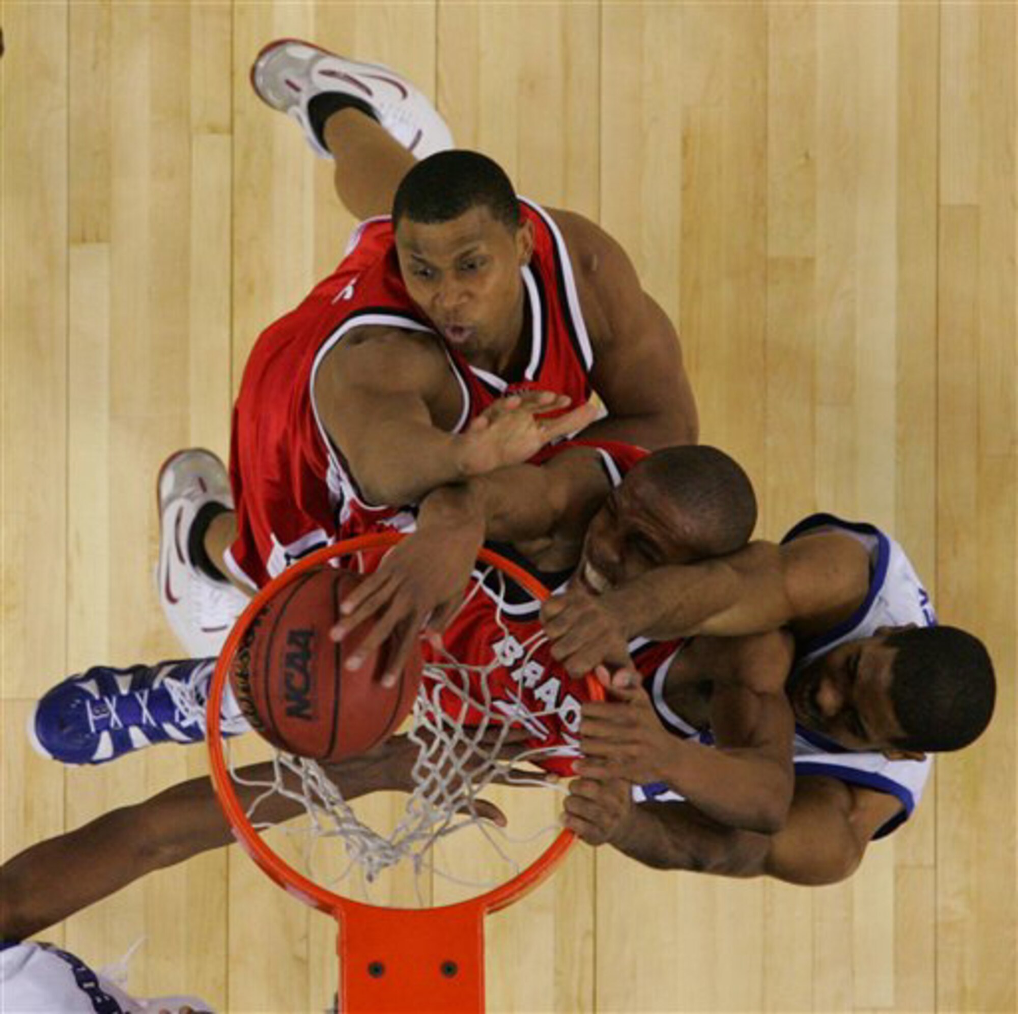 With a seven-foot wingspan and a 44-inch vertical leap, Wright powers his way to the basket to dunk the ball. (Courtesy photo)