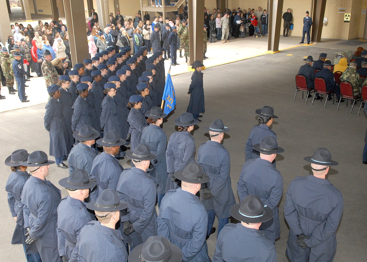 Military training instructors for the 321st Training Squadron at Lackland Air Force Base, Texas, are shown in the foreground during the Feb. 2 ceremony that temporarily inactivated the squadron. The MTIs now are assigned to other basic military training squadrons on Lackland. In the background are Airmen in the squadron's final graduating class. (USAF photo by Robbin Cresswell) 