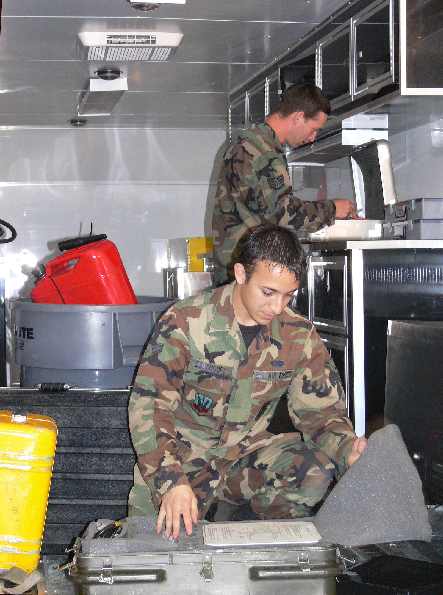 Airman 1st Class Marcos Dominguez and Staff Sgt. Brendon Holland, 723rd Aircraft Maintenance Squadron mobility journeymen, prepare the helicopter support trailer to depart for Atlantic Rescue ‘07 at McDill Air force Base, Fla. Oct. 24, 2006. (U.S. Air Force Photo by Master Sgt. Mona Ferrell)