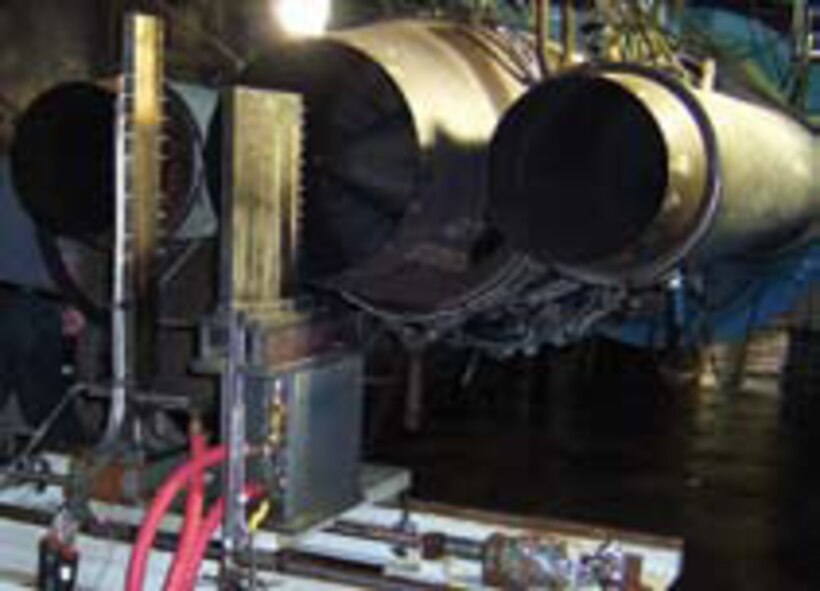 Emissions sampling being measured during alternative fuel tests on a TF33 engine