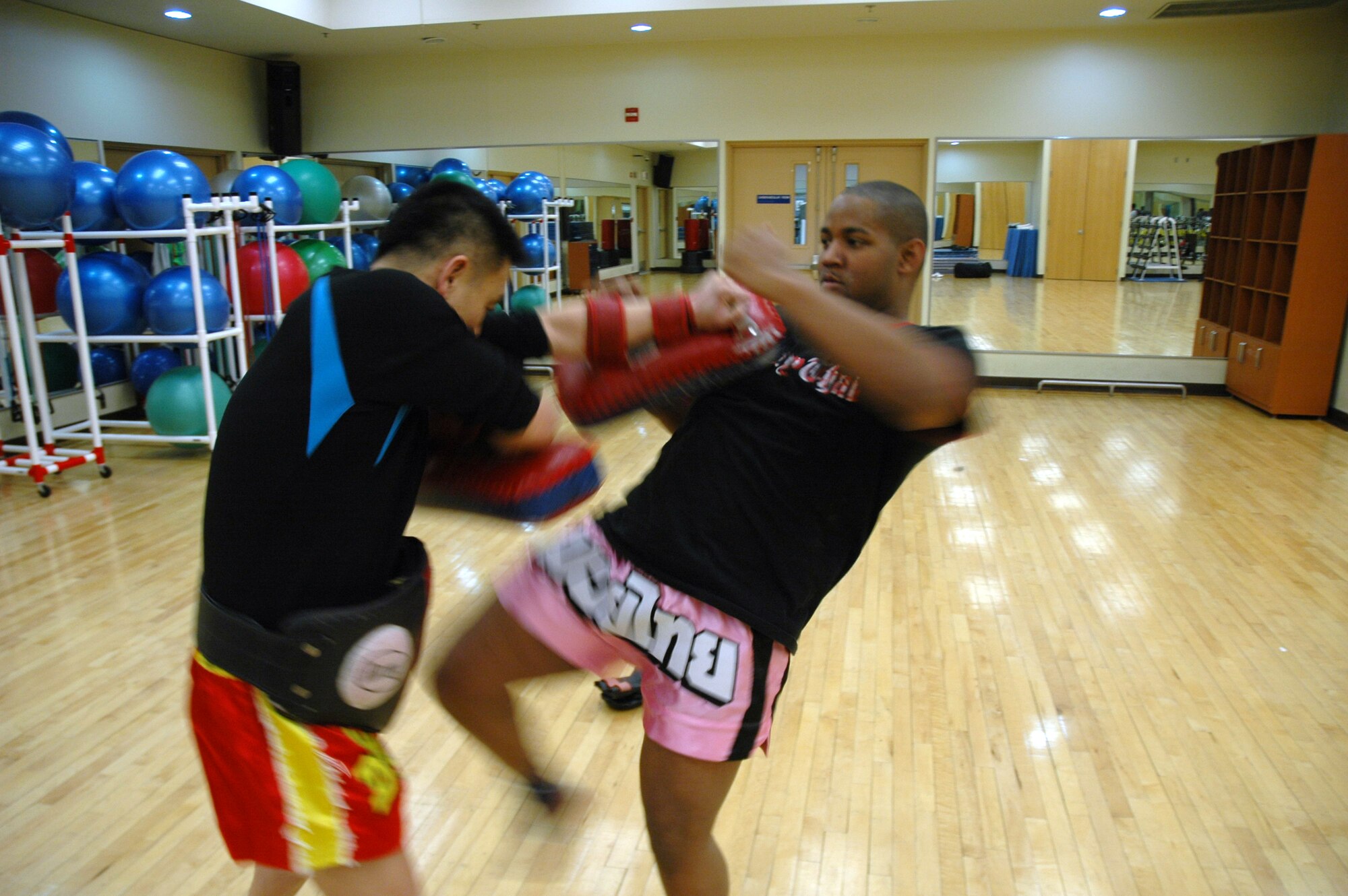 OSAN AIR BASE, Republic of Korea --  Johnathan Lytle spars with his instructor, Master Chae, Kim Myong at the Osan Fitness Center Thursday. (U.S. Air Force photo by Senior Airman Brok McCarthy)