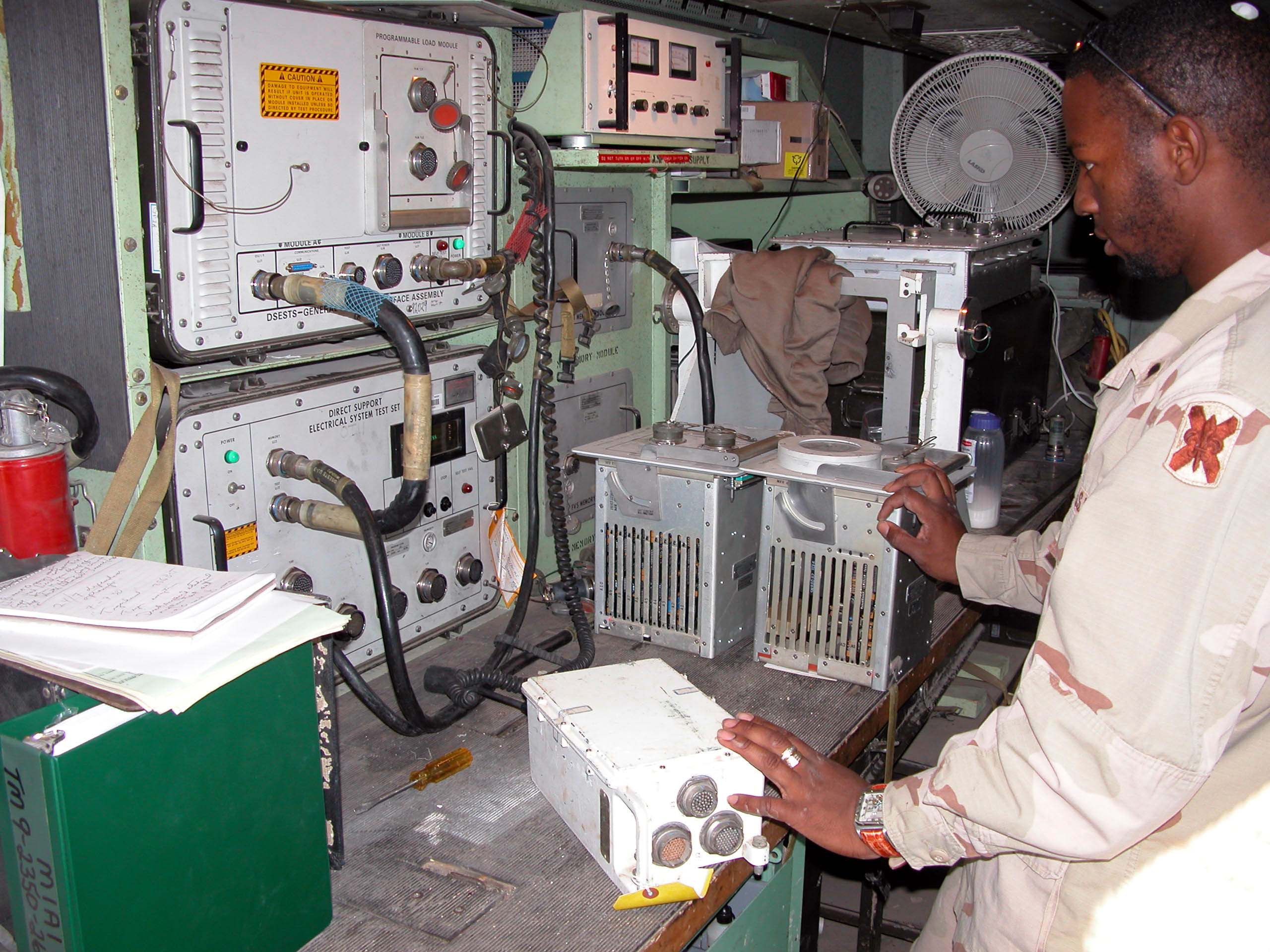 Spc Frank Greene Tests A Power Control Unit For A Bradley Fighting spc-frank-greene-tests-a-power-control-unit-for-a-bradley-fighting