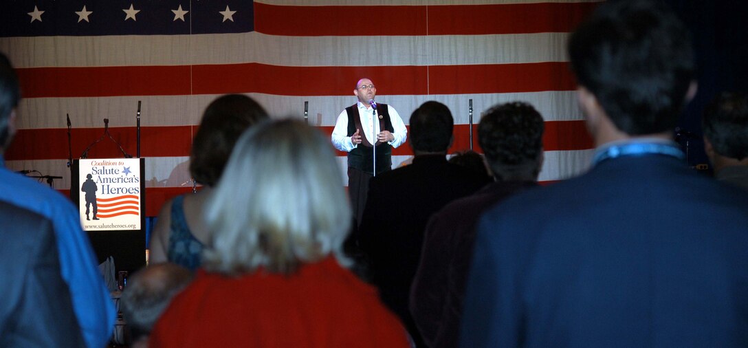 Irish Tenor Ronan Tynan performed "God Bless America" and a  selection from the musical "The Man of LaMancha" for an appreciative audience.  Tynan interrupted a vacation to perform at the Coalition to Salute America's  Heroes Gala Gratitude Tribute to Veterans in Orlando, Fla., Dec. 9. Photo by  Samantha L. Quigley